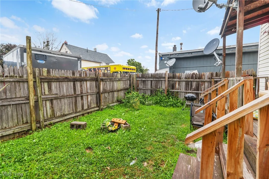 View of fenced backyard