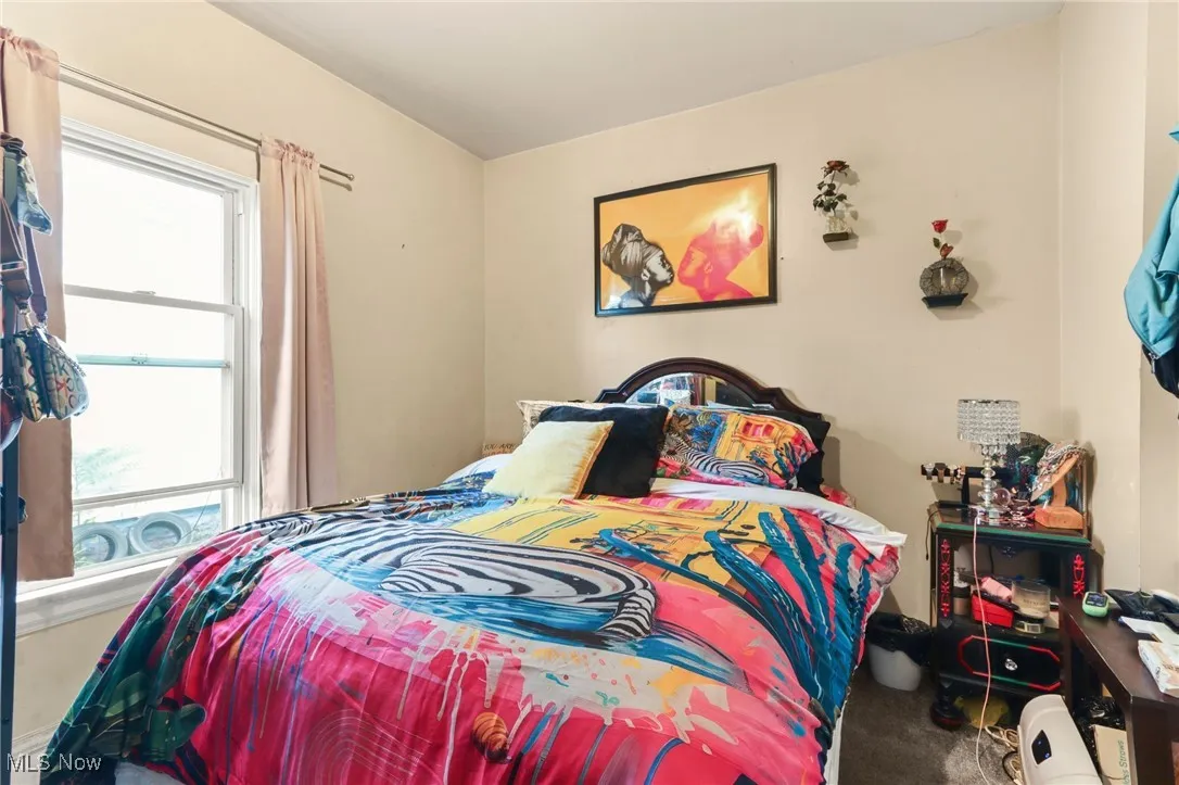 Bedroom featuring carpet flooring