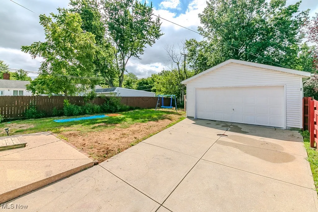 Detached garage with a trampoline