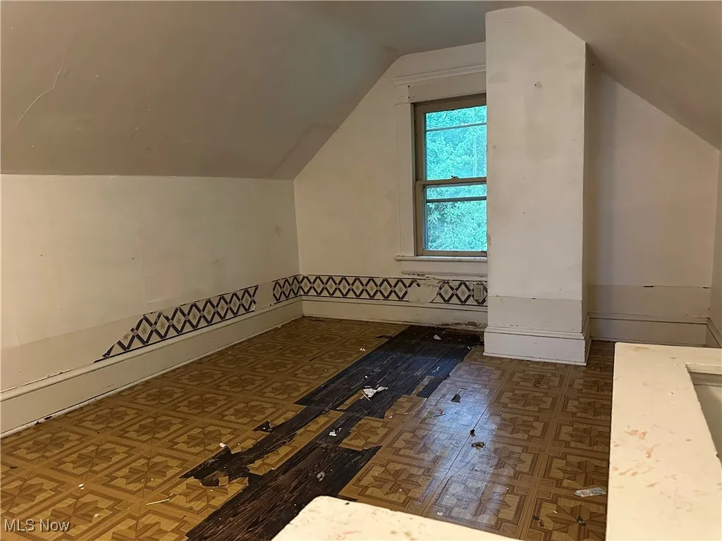 Bonus room featuring vaulted ceiling
