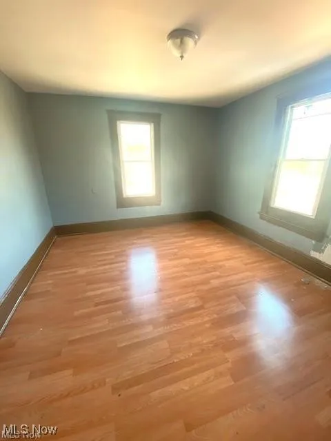 Empty room featuring light wood-style floors