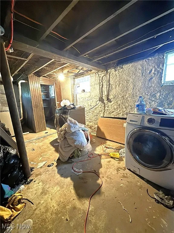 Below grade area with separate washer and dryer