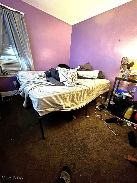 Bedroom featuring carpet