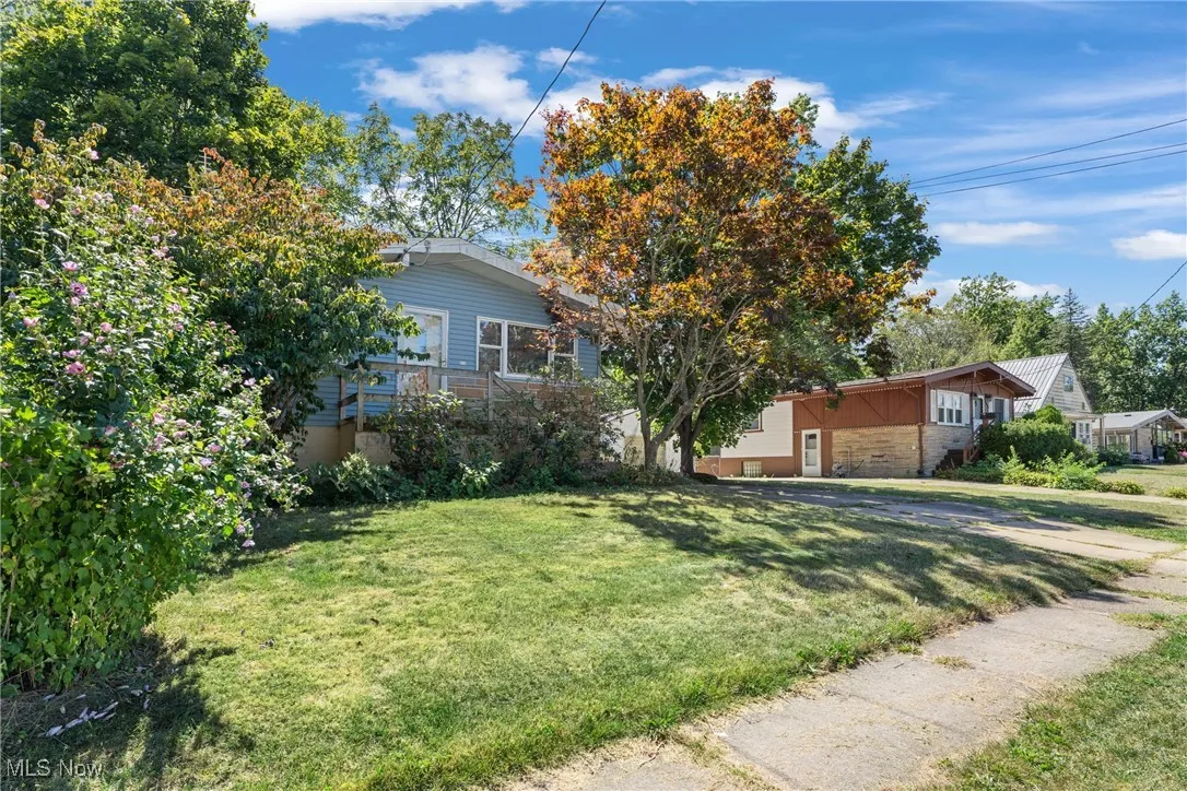 View of front of house with a front yard