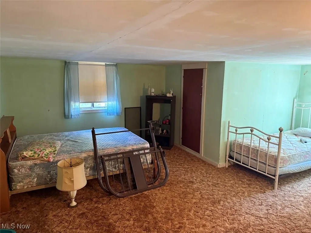 Bedroom with carpet flooring