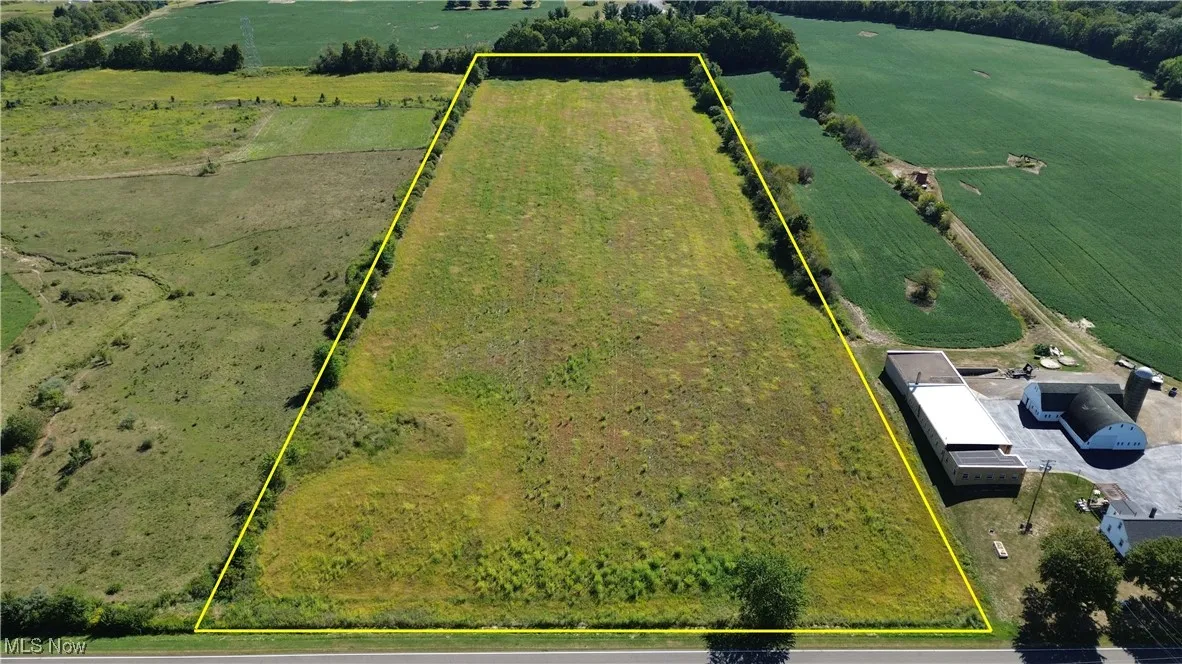 Aerial view with approximate property parcel outlined