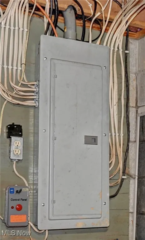 Utility room featuring electric panel