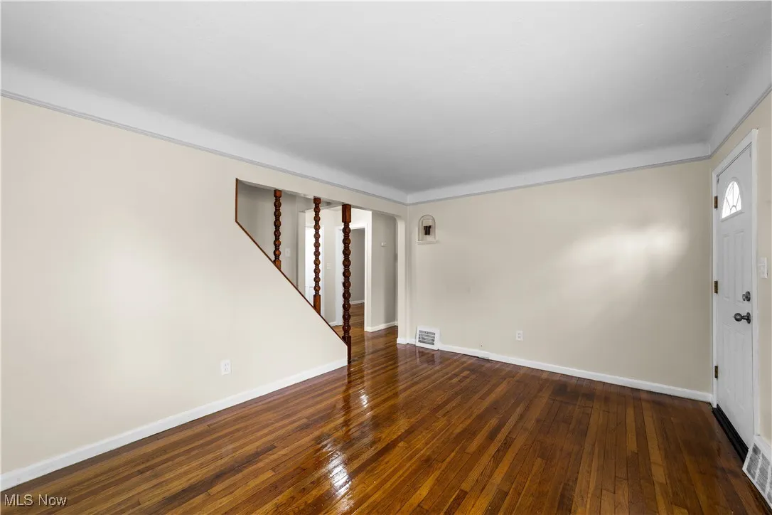 Another view of the living room.   This photos shows you the front door entry.