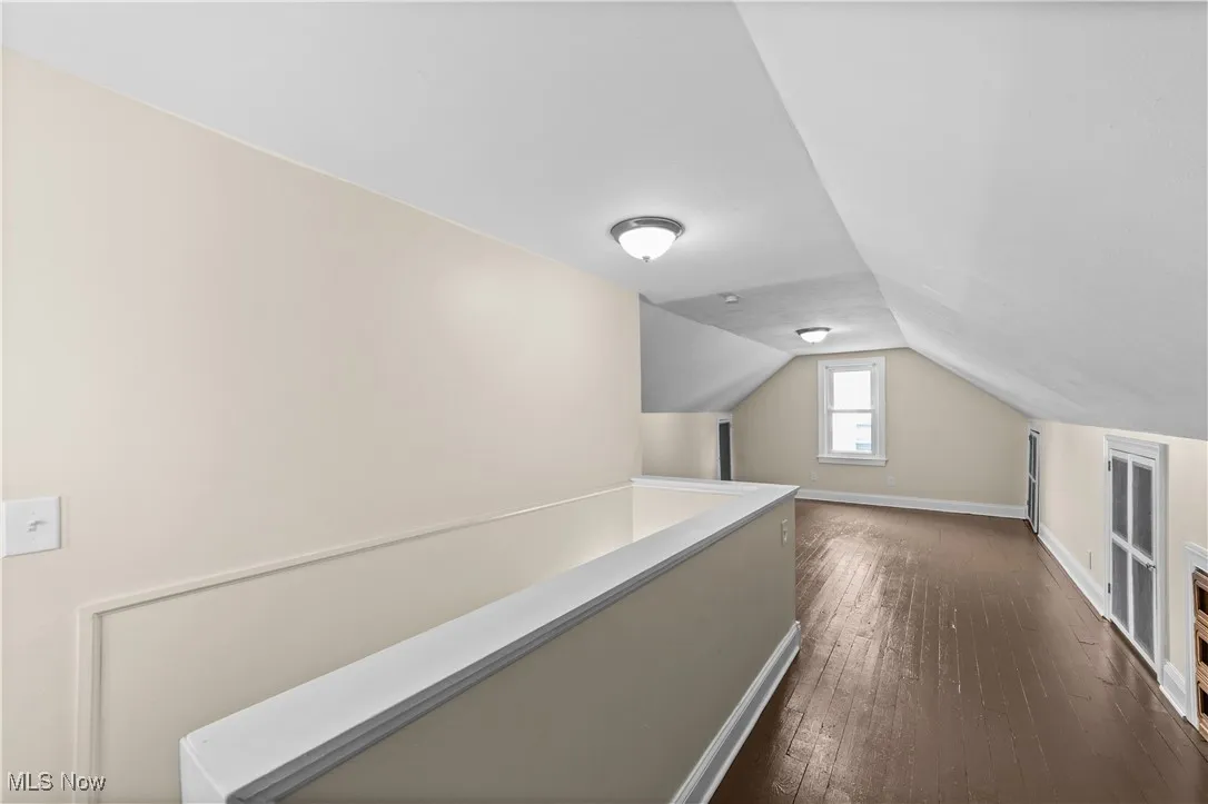 View of the 2nd floor bedroom/office/den room with hardwood flooring.