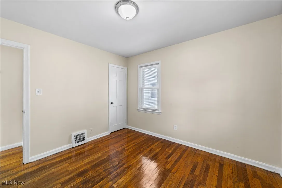 View of 1st floor bedroom that has natural light and closet.
