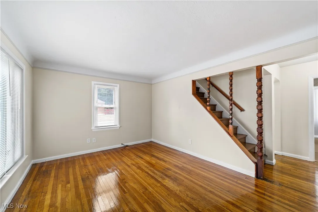 Another view of the family room.  Notice the natural light in this home.  Staircase leads to the third bedroom/den/office area