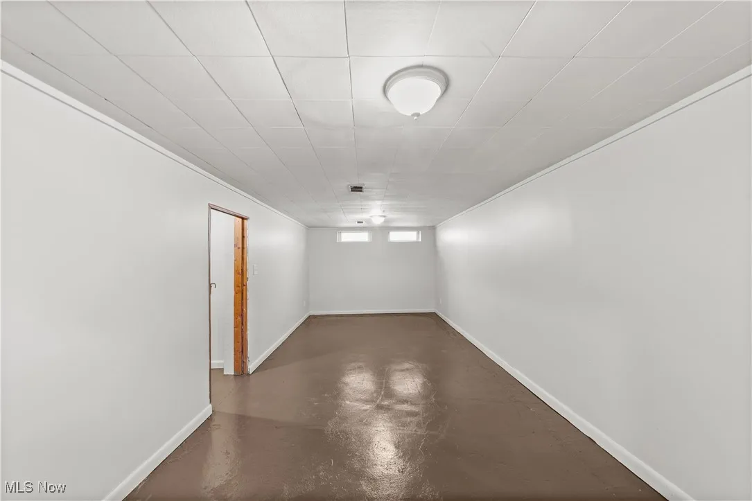 This is a partial finished lower level providing you additional living space