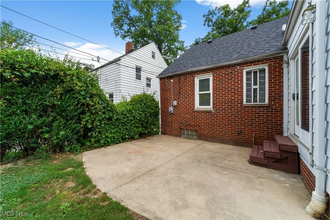 This is the back patio off the kitchen.  Walk out and enjoy this beautiful back yard that is very private.