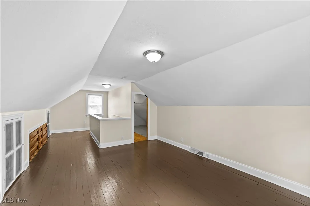 View of 2nd floor bedroom and shows storage.