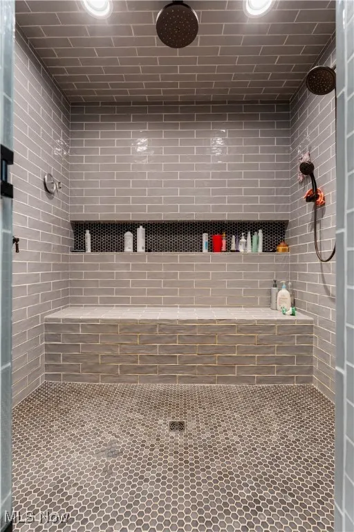 Tiled shower room in the master bath.