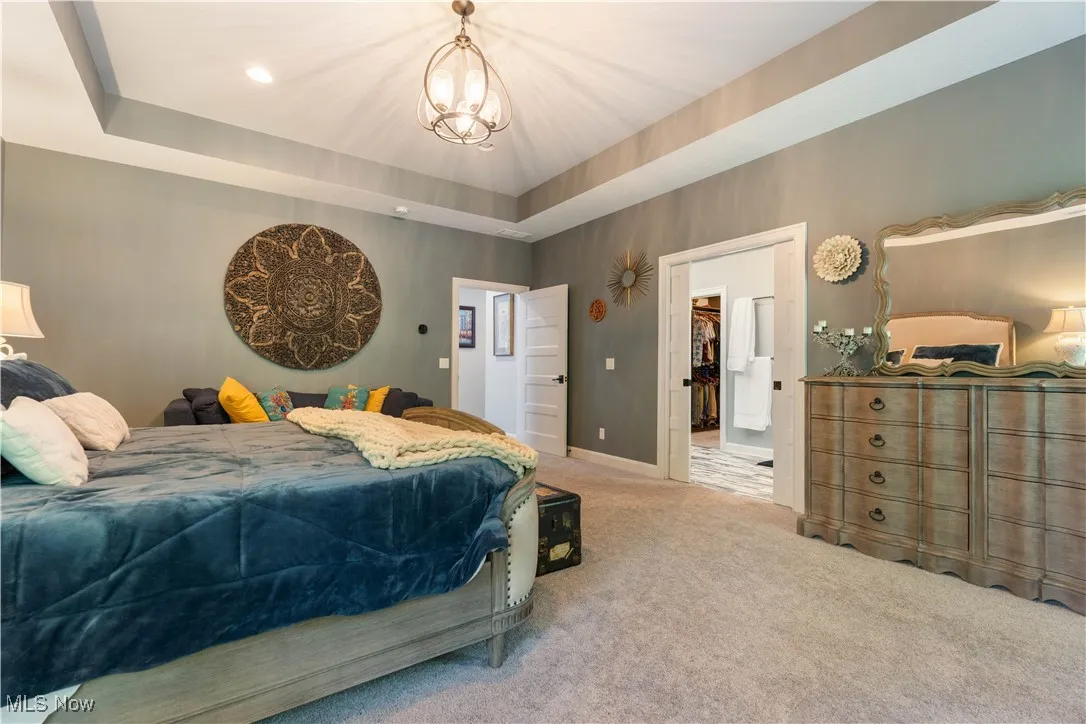 The master bedroom with adjoining master bath and large walk in closet.