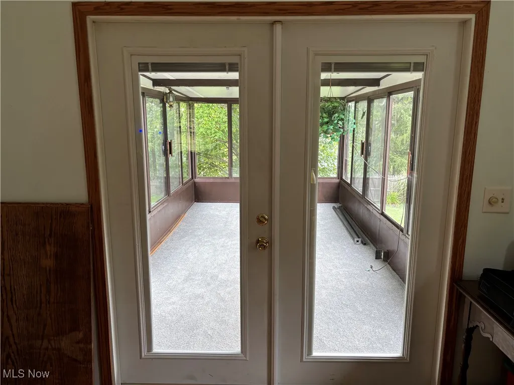 View of entryway to the 3 season sunroom.