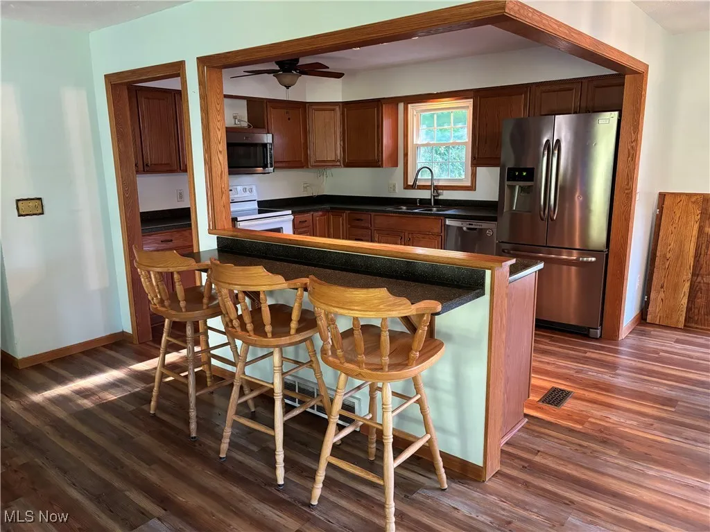 Kitchen with breakfast bar.