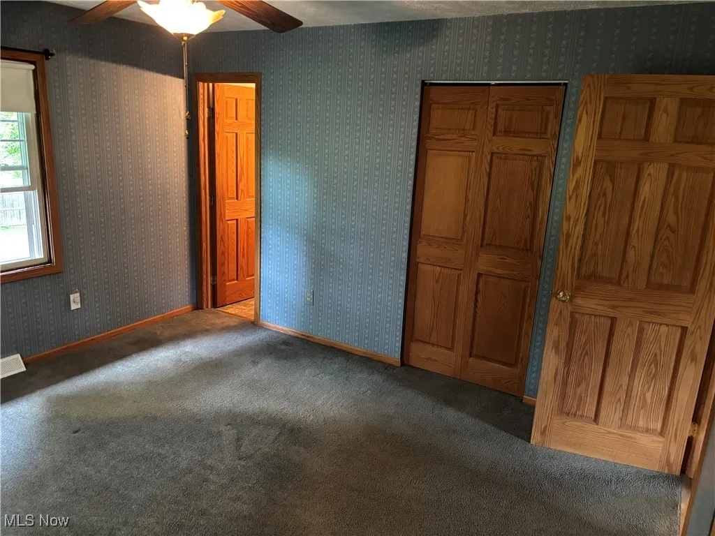 master bedroom, showing entrance to ensuite bathroom and additional closet
