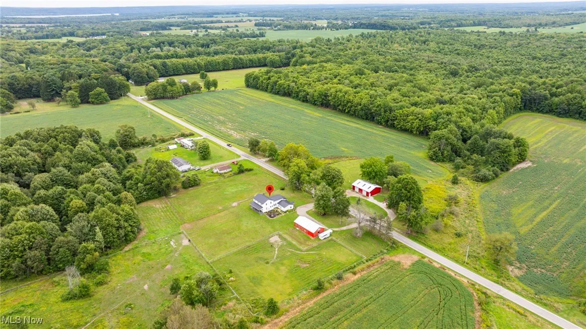 Aerial view of sparsely populated area with extensive farmland