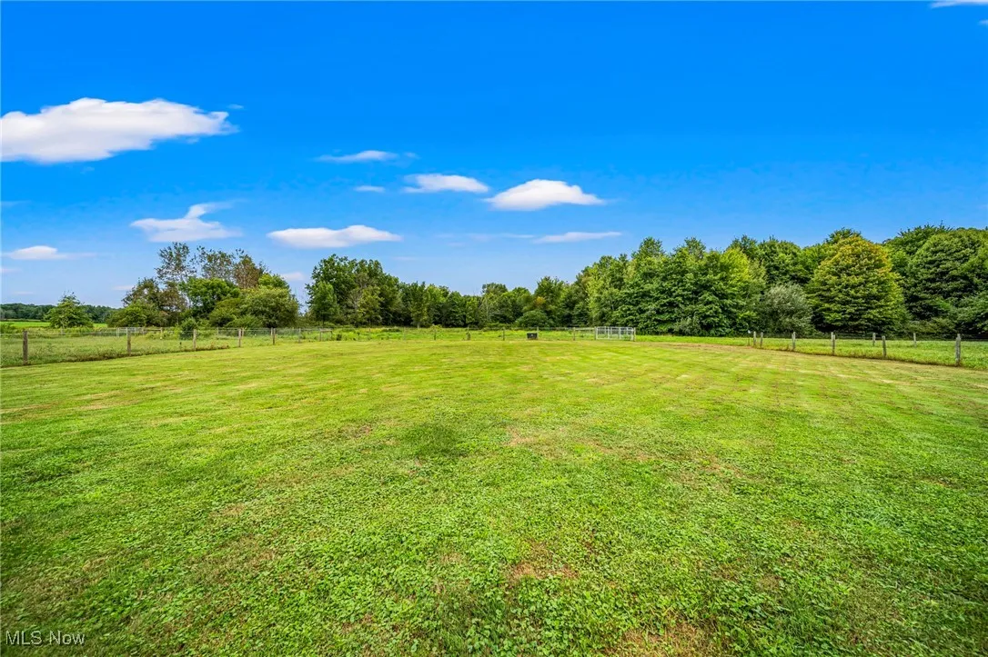 View of yard with a view of countryside