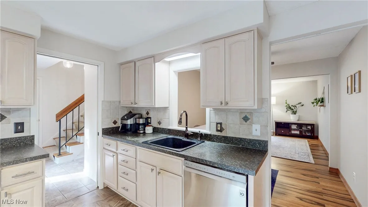 Additional Kitchen view*pocket door to front entryway/hallway