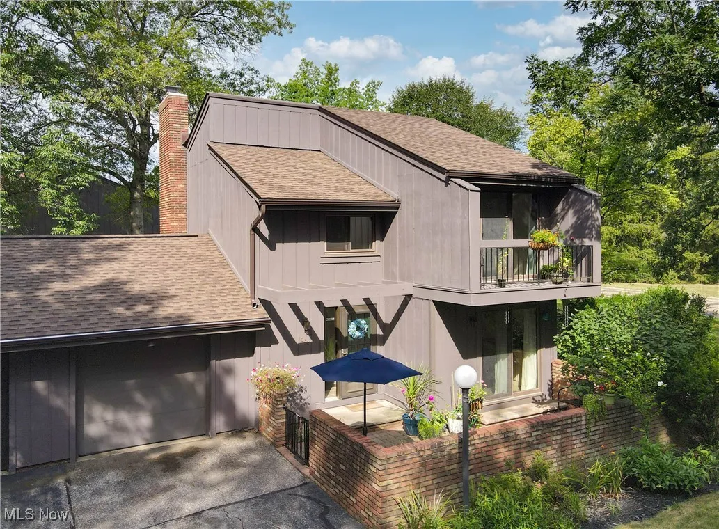 Additional front view with 1 car, attached garage w/opener*Private Courtyard area and balcony on 2nd level.
