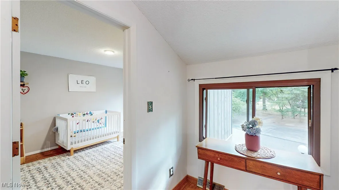 2nd level - small loft-style area w/large storage closet & view into BR 2