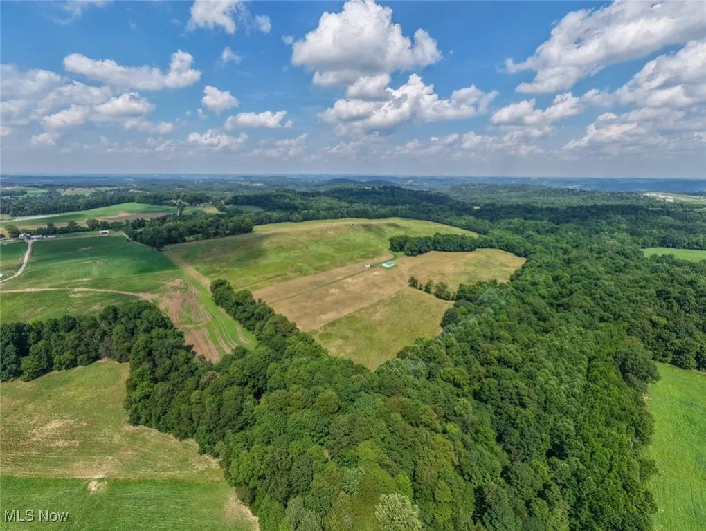 View of rural area featuring a forest