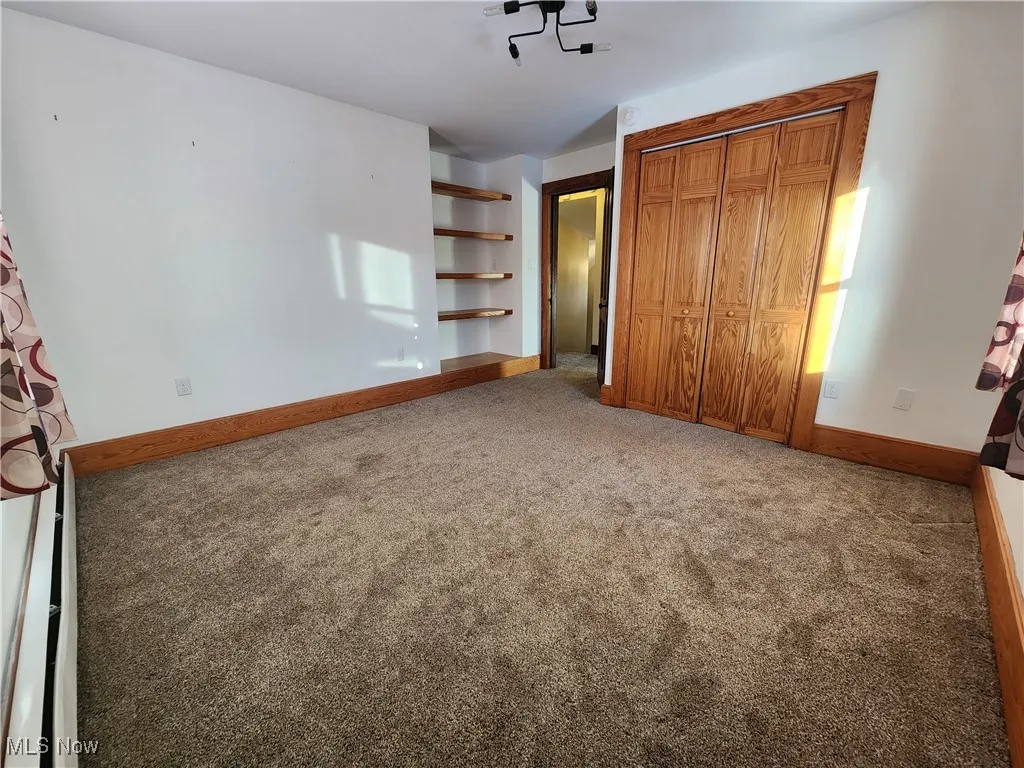 Bedroom #3 with built-in shelves