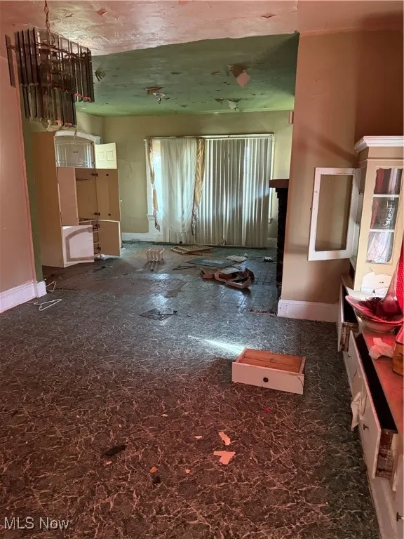 Living room featuring baseboards