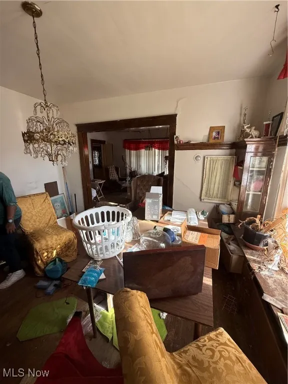 Living area featuring a chandelier