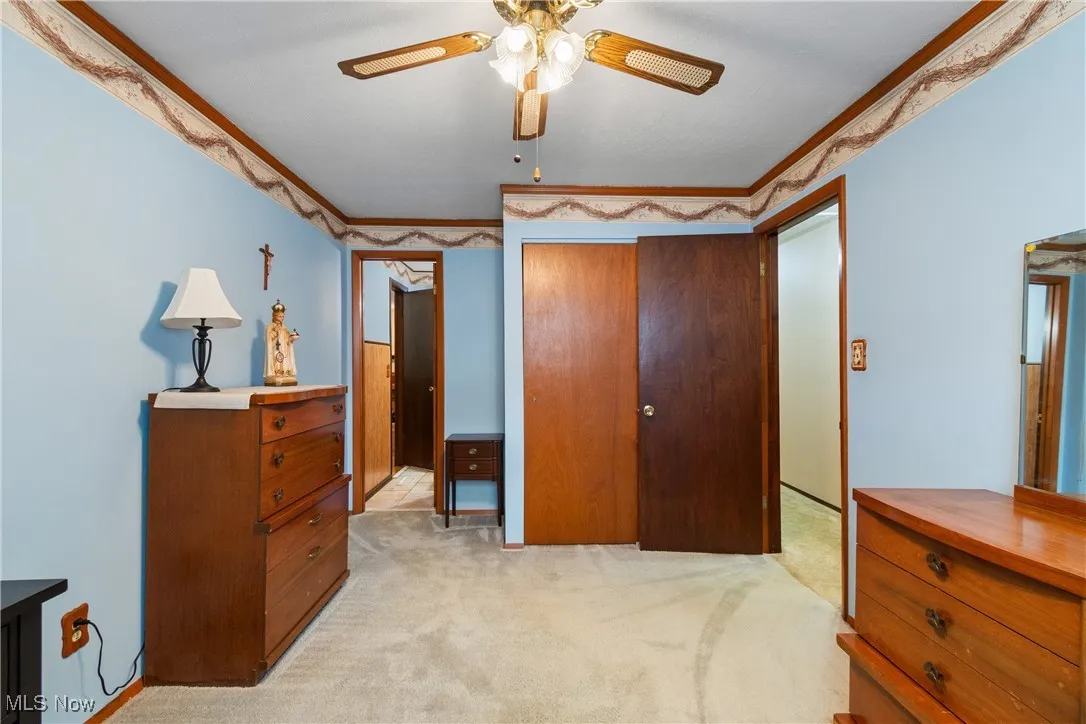 Primary bedroom with access to the half bath