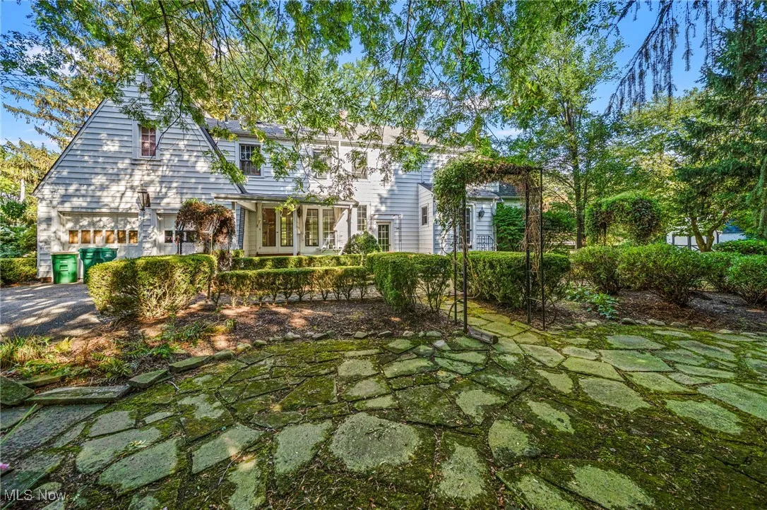 Back of property with driveway