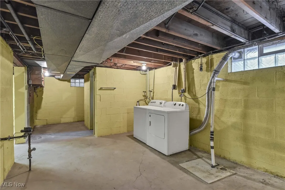 Basement with washer and dryer