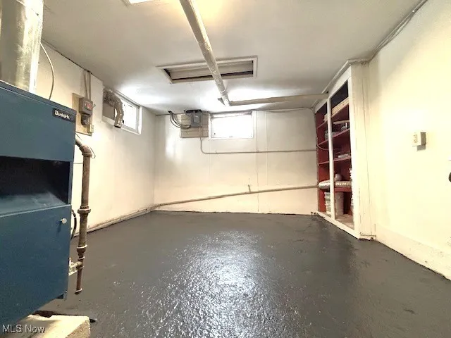 Below grade area with heating unit