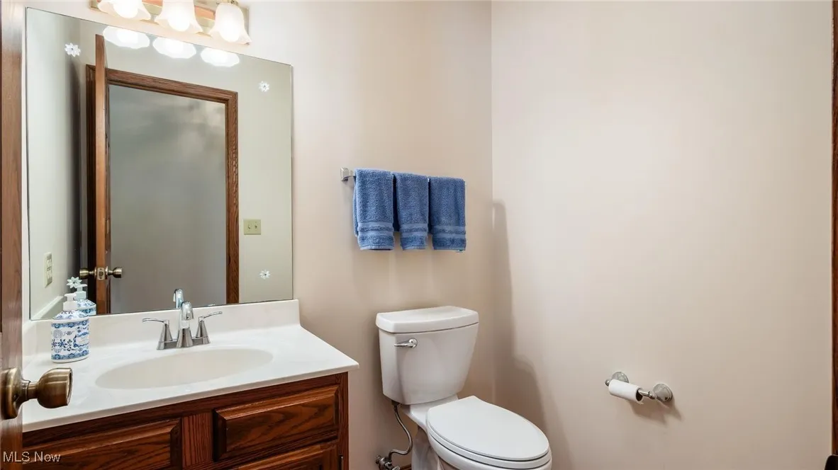 Bathroom featuring vanity and toilet