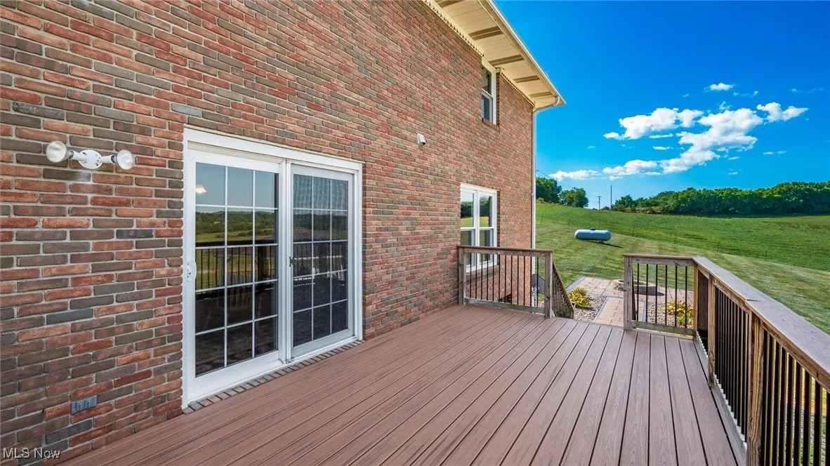 Wooden deck with a yard