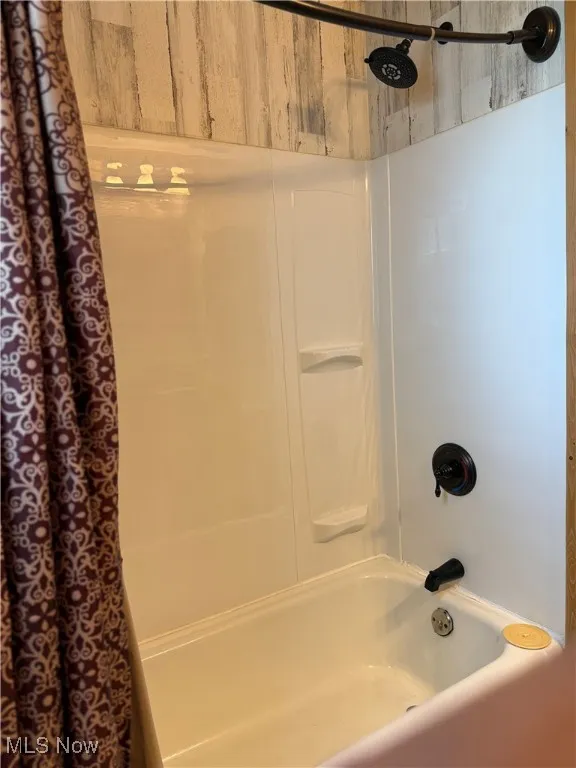 Bathroom with shower / tub combo