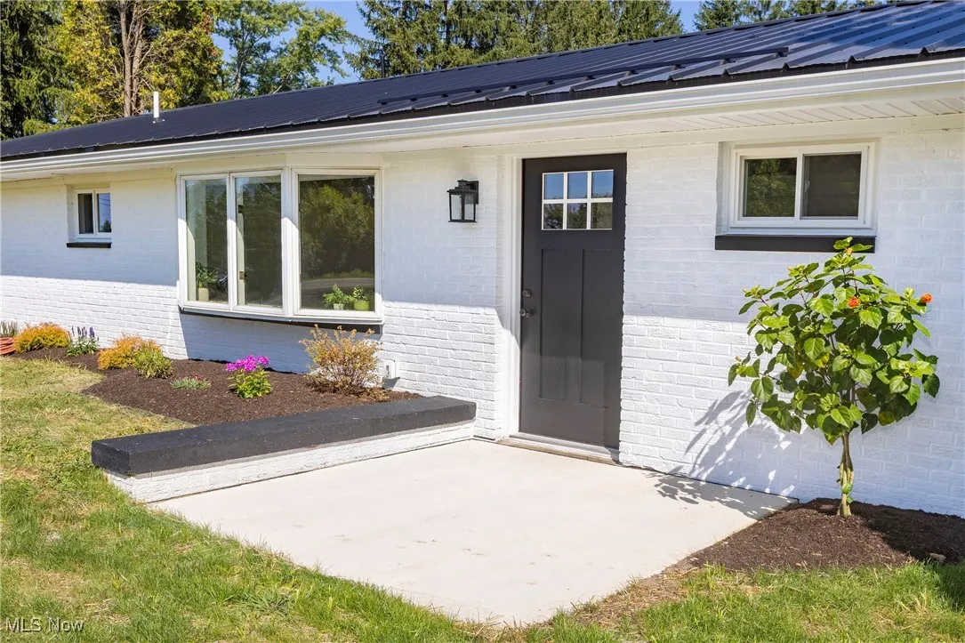 Fresh landscaping and a nice set back off the road, too!