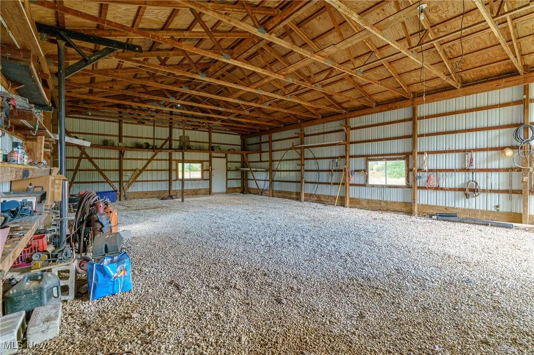 View of inside of pole barn and front door