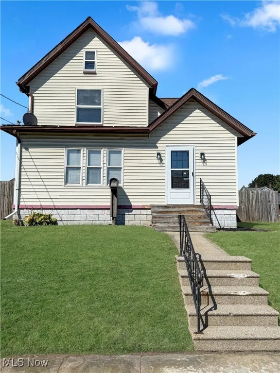 View of front facade with entry steps
