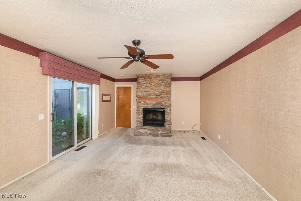 Master Bedroom includes its own fireplace and direct access to center court yard