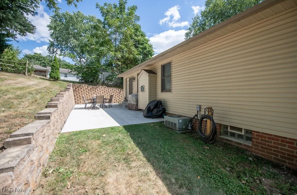 View of back of home with patio area