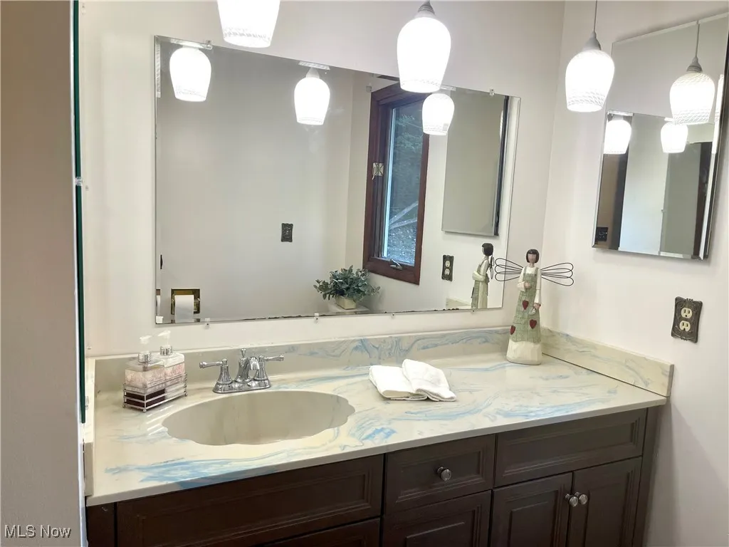 Bathroom featuring vanity on the first floor
