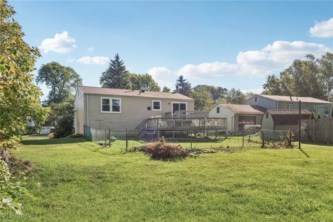 Rear view of house featuring a deck