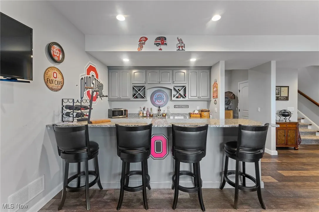 Built-ins, sink and granite countertops.