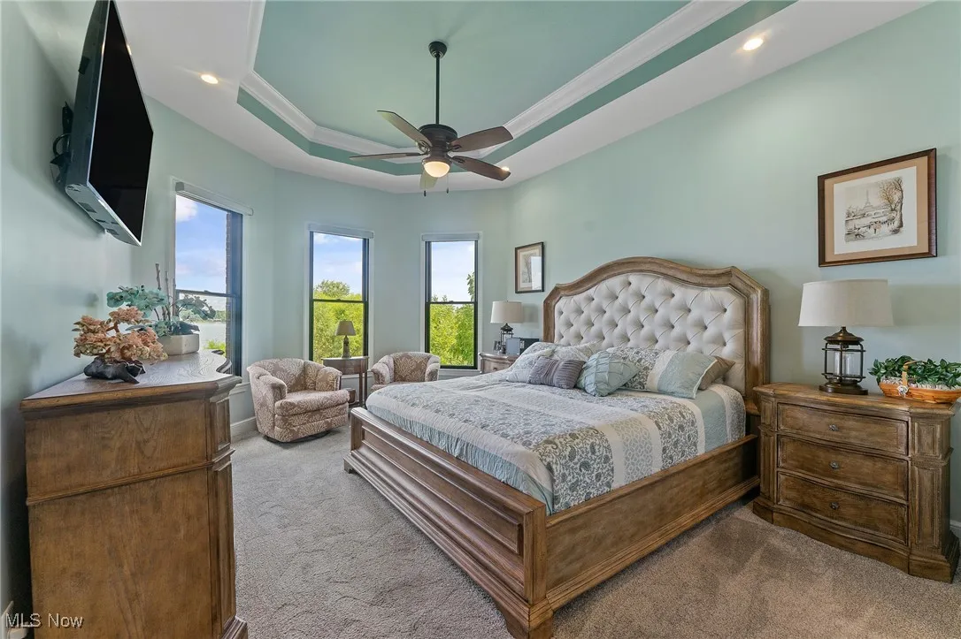 Spacious with bay window, recessed tray and crown molding detail.