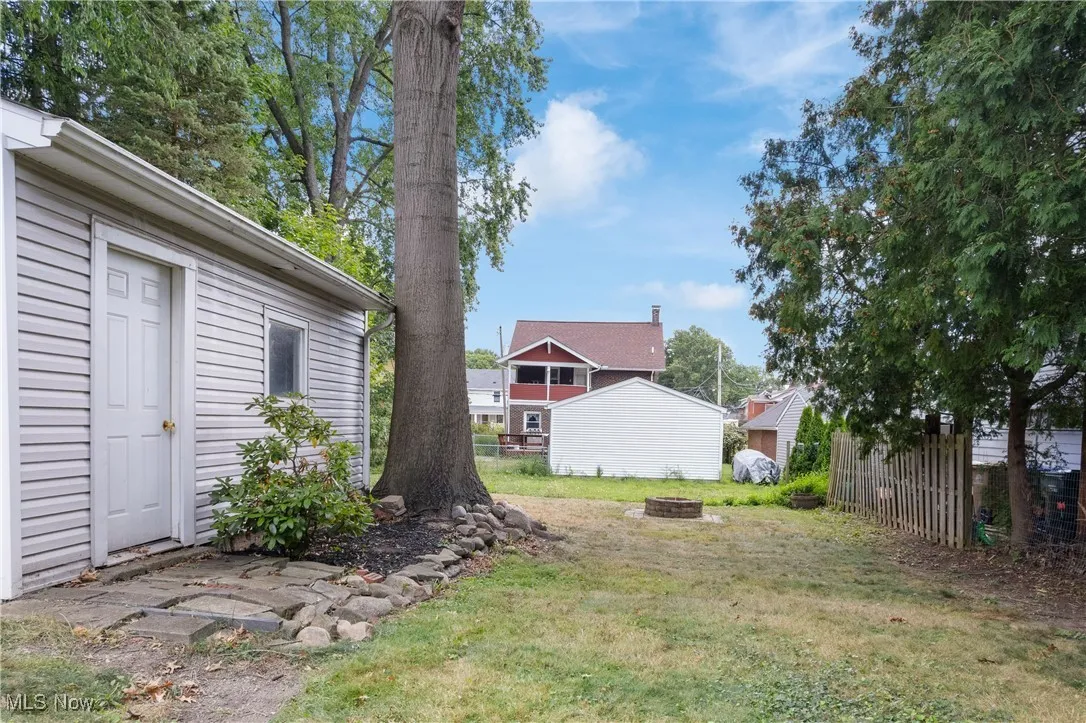 View of yard featuring a fire pit
