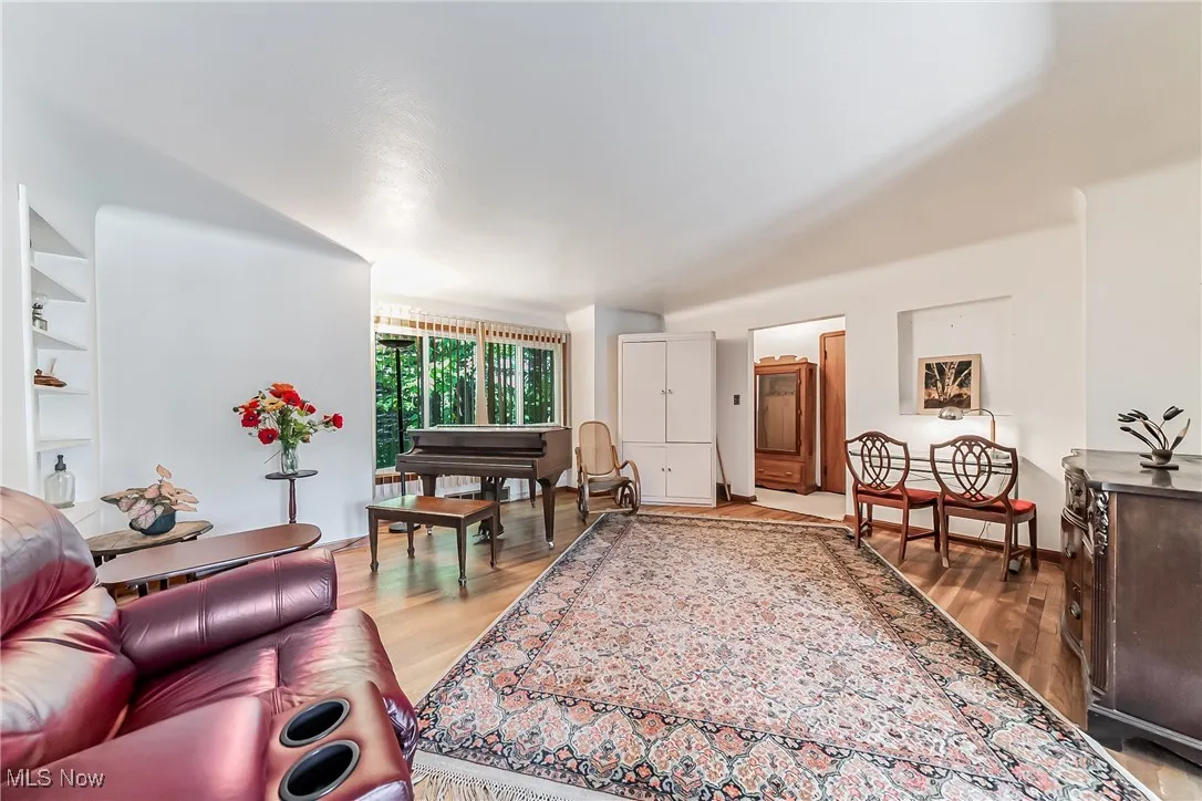 Primary living room featuring hardwood / wood-style flooring